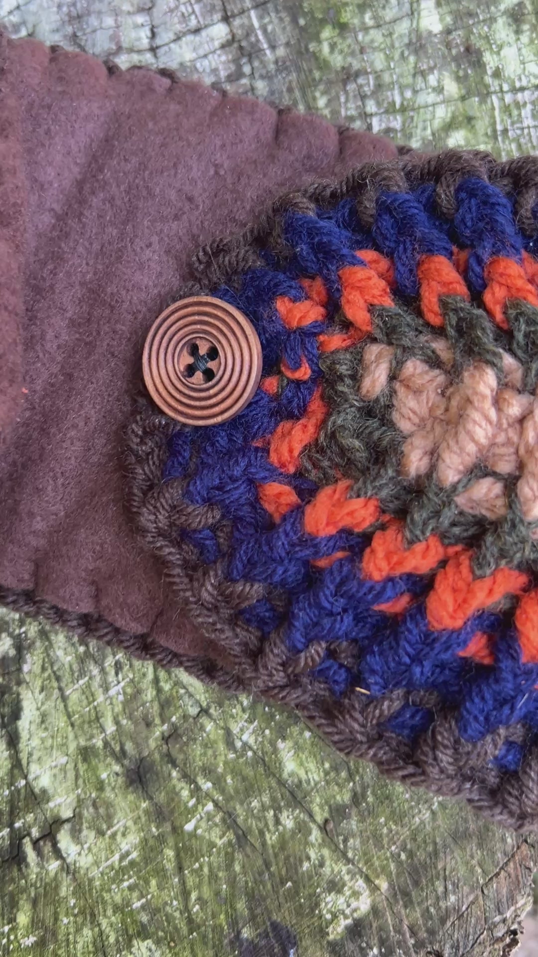 striped winter head band with fleece lining and working button