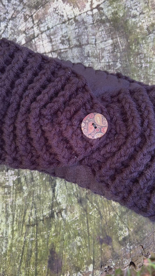 black winter headband with fleece lining and button