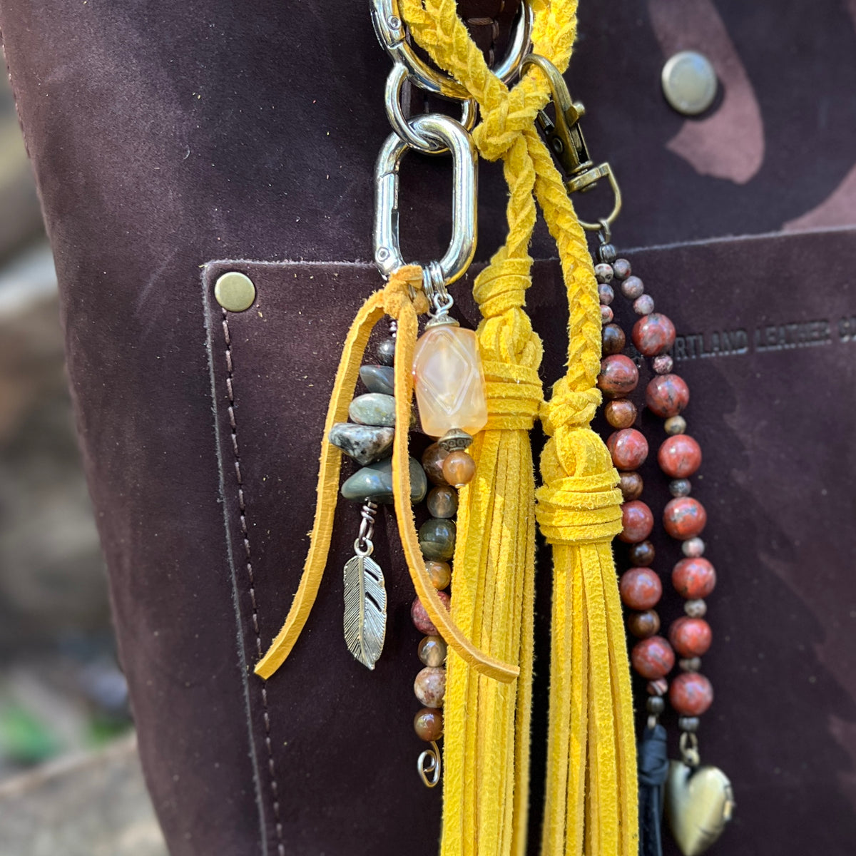 purse charm with yellow tassel and natural stone beads , yellow tassel and beaded charm on brown tote