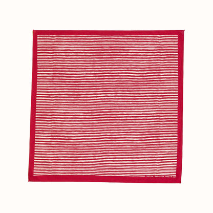Red and white striped bandana on a white background