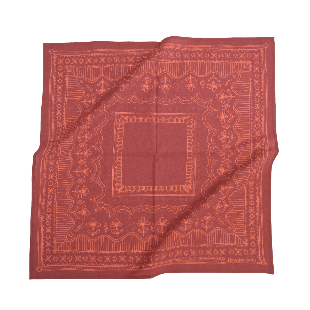 Red bandana with intricate patterns on a white background