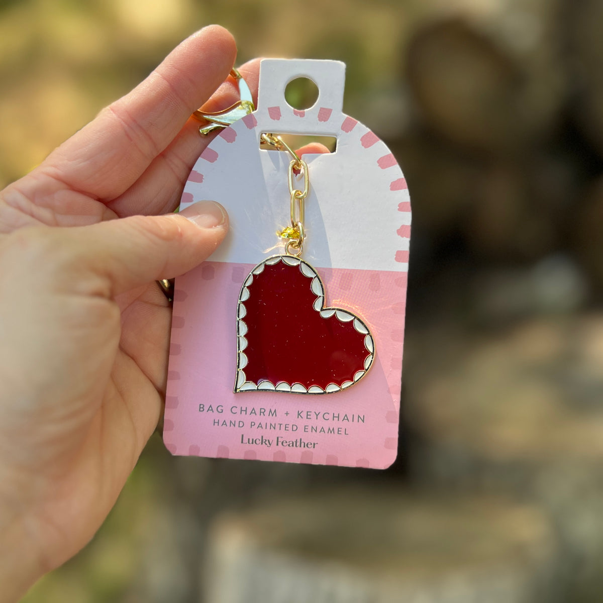 red enameled heart bag charm