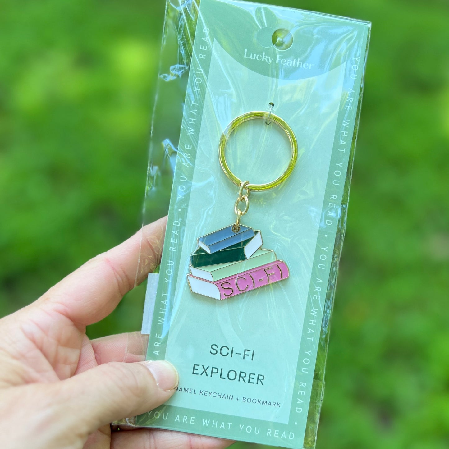 book lover keychain in package