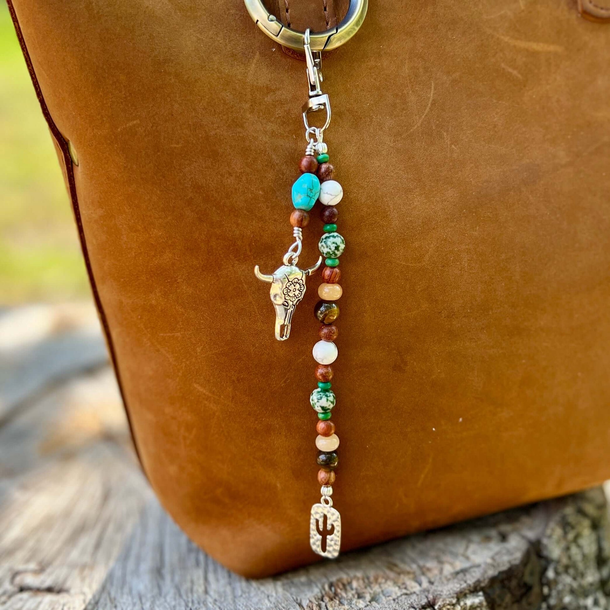 beaded bag charm with steer skull and cactus charms