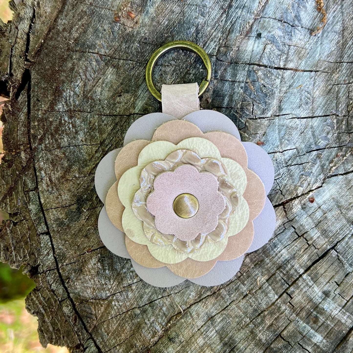 leather flower bag charm in shades of tan