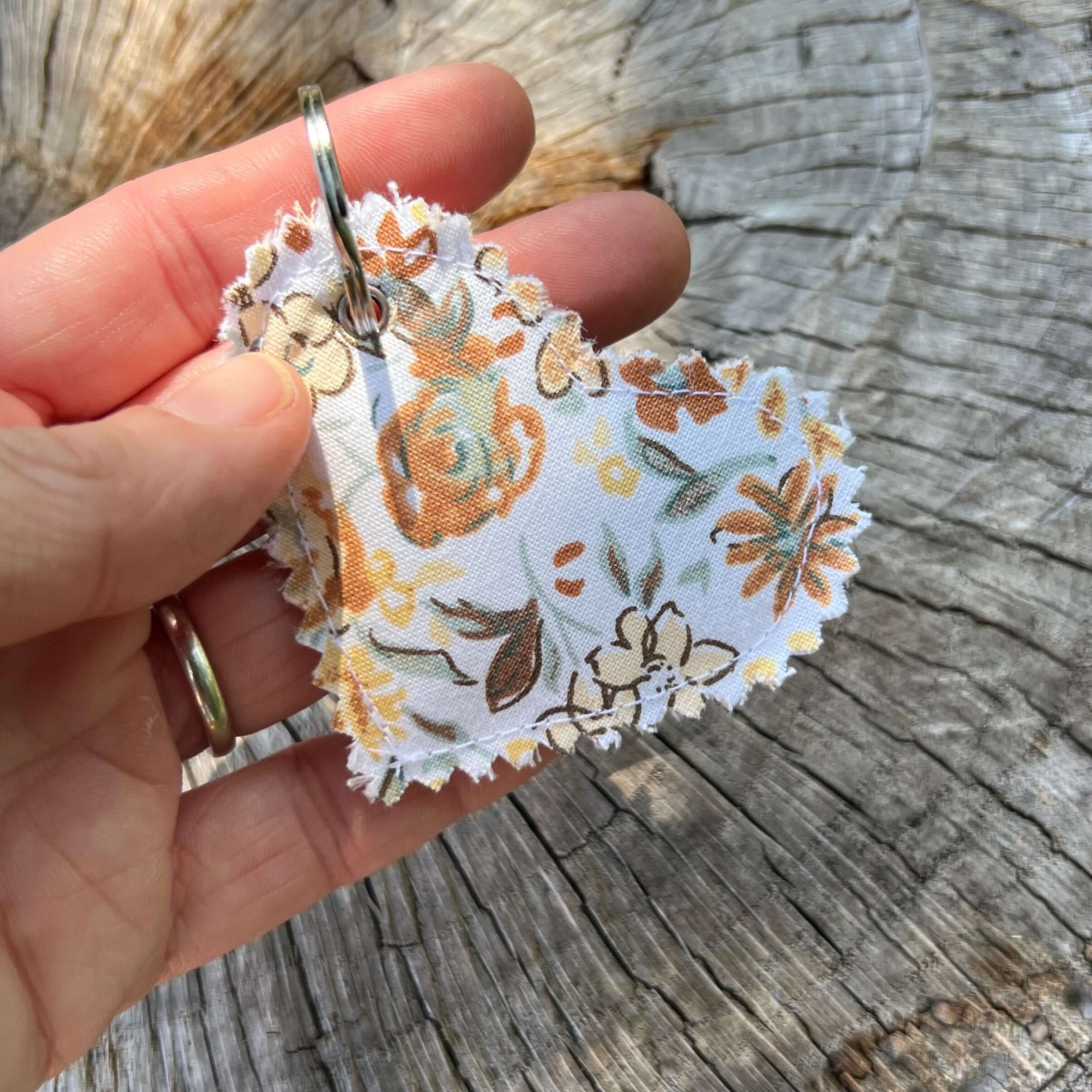 yellow floral puffy heart bag charm