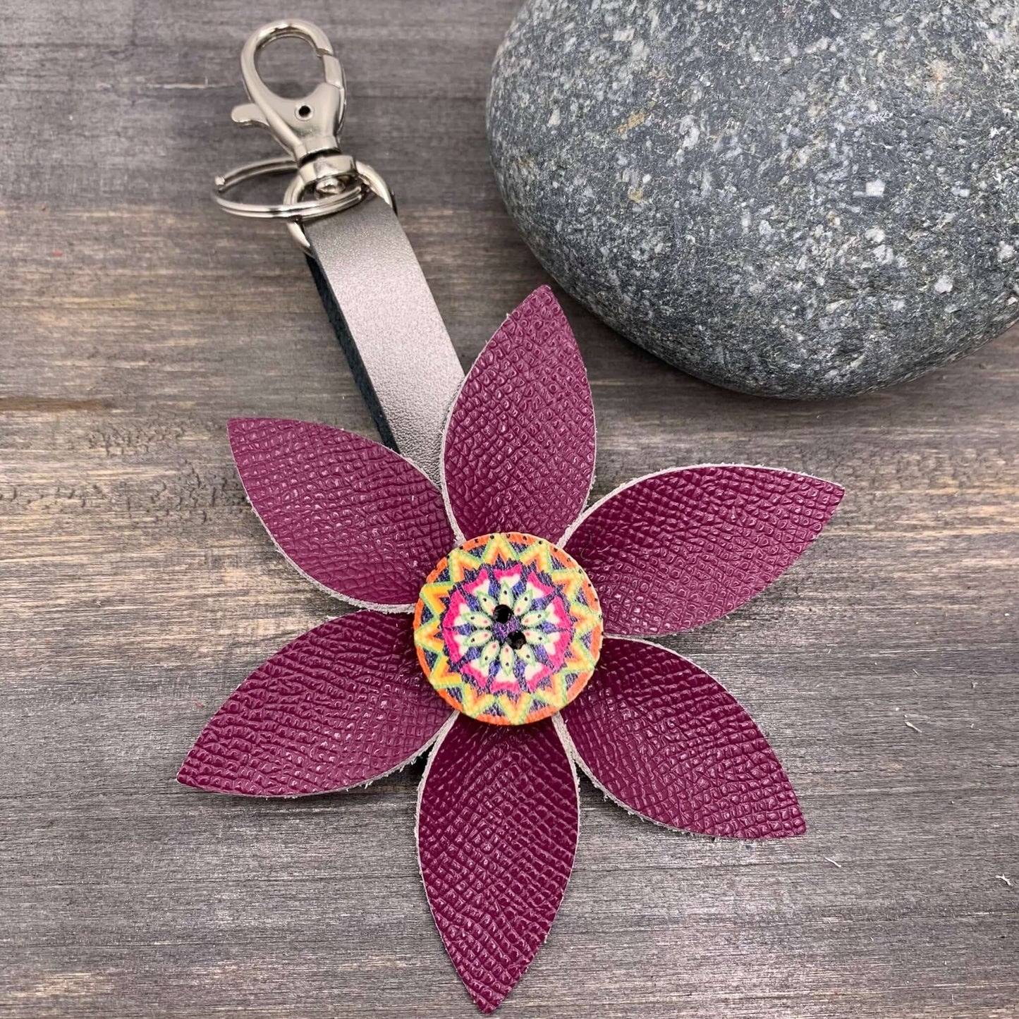 Leather Flower Bag Charm Keychain - Deep PinkLeather purse charms are a great way to update your handbag, purse or tote. Each flower is crafted with leather petals securely sewn and glued together. Colorful wooden button adds a little boho flair. Flowers