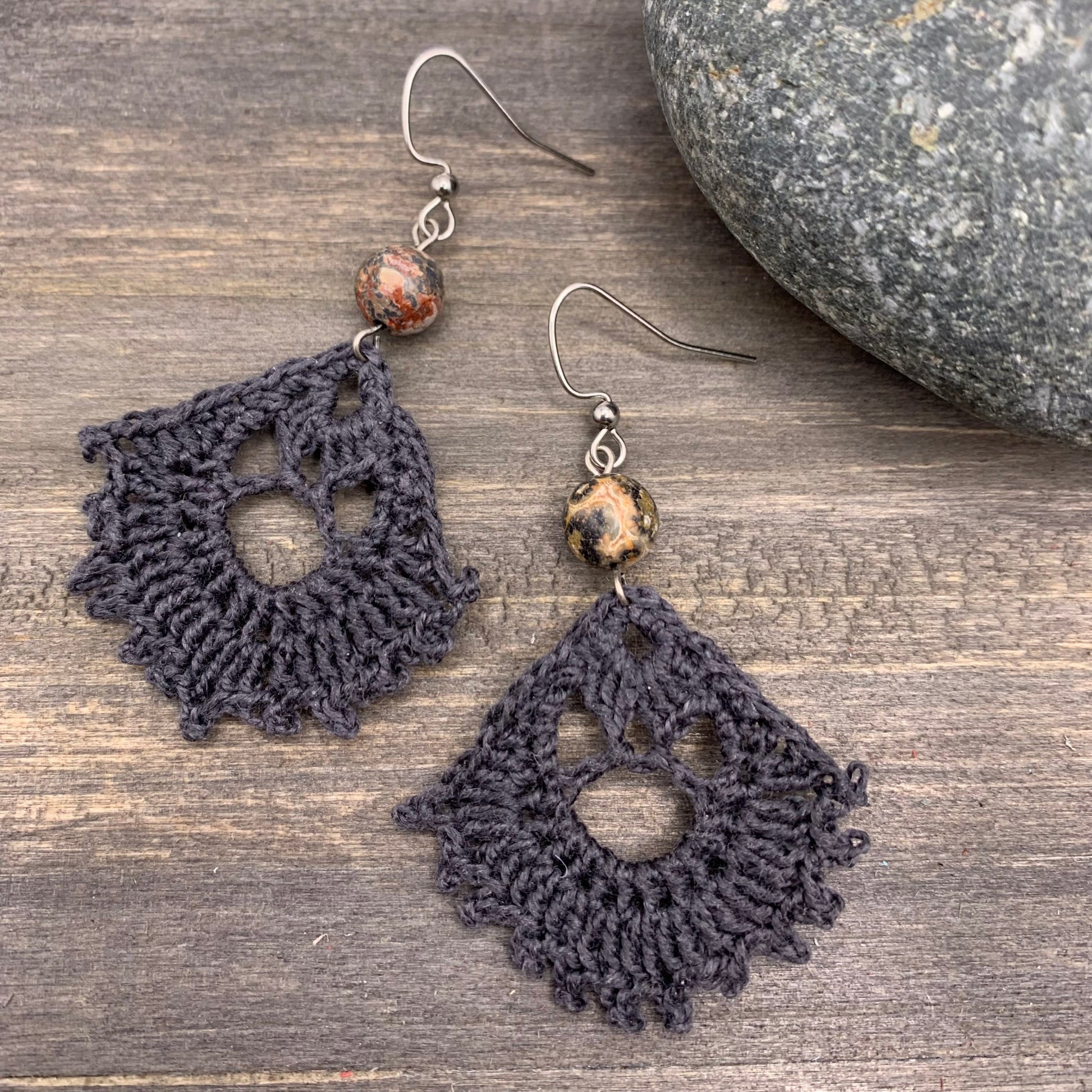 dark gray crocheted earrings with leopard jasper