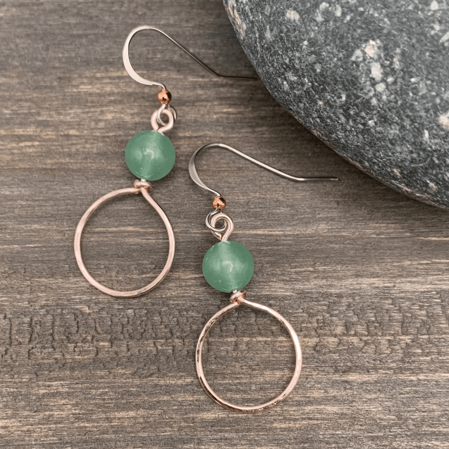 Dangle Hoop Earrings - Rose Gold with Green AventurineSmall hoops are accented with natural stones for chic everyday style. Hoops are hand formed with nickel free and tarnish resistant enameled copper wire. Stone notes: Green Aventurine is provides streng