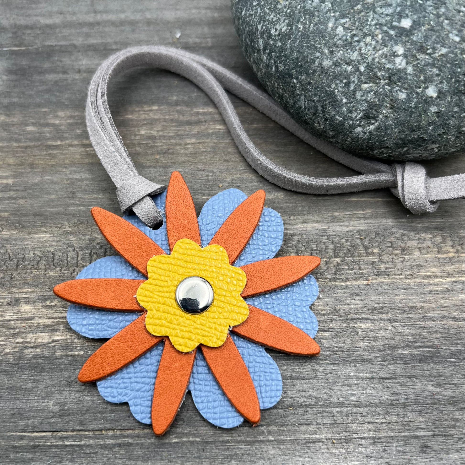 Small Leather Flower Purse Charm - Blue, Orange and YellowWhen you want just a little pop of color for your handbag or purse. Update an old bag or tote with a genuine leather layered flower. Add a single flower to your small cross body or layer with other