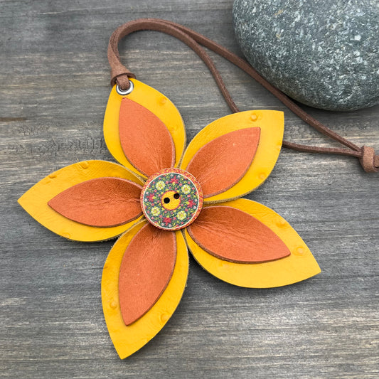 orange and yellow leather flower bag charm