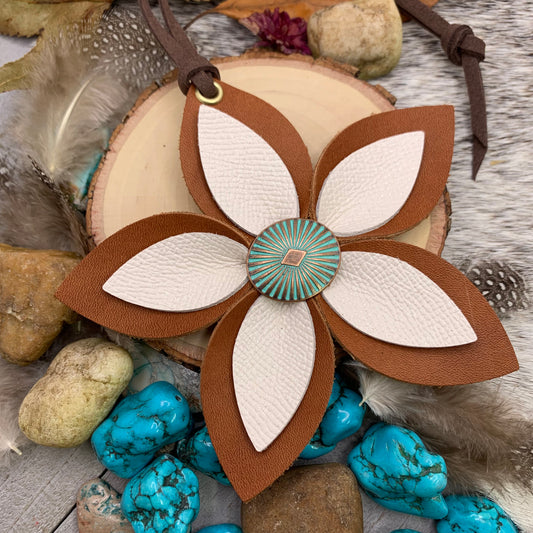 brown and white leather flower bag charm