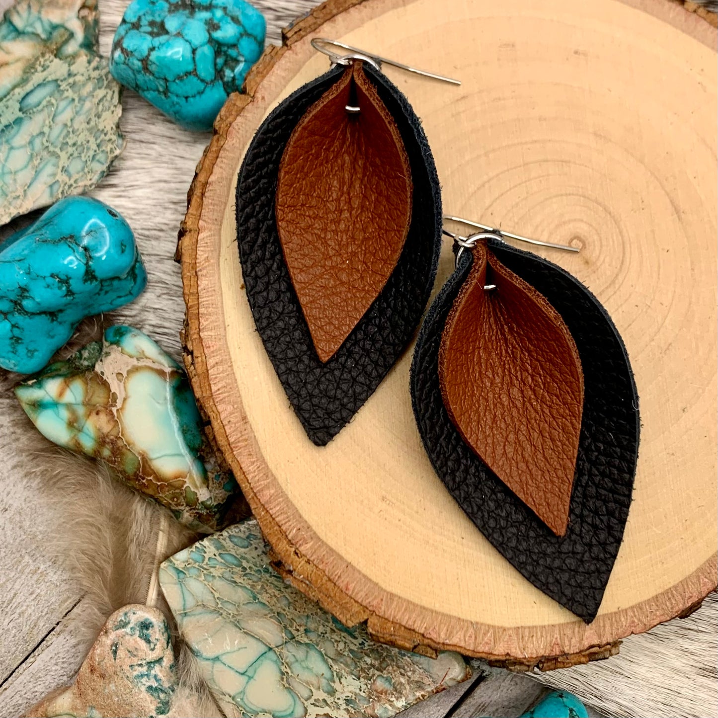 brown and black leather leaf earrings